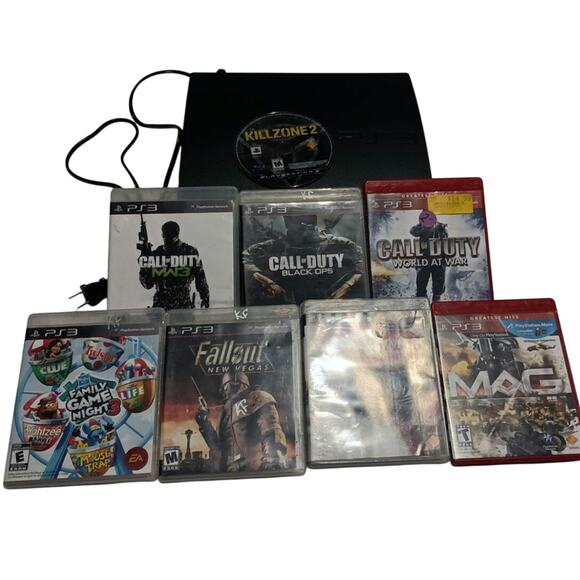 PS3 FAT GAMING SYSTEM BUNDLE. 8 GAMES AND PS3 - Picture 1 of 7